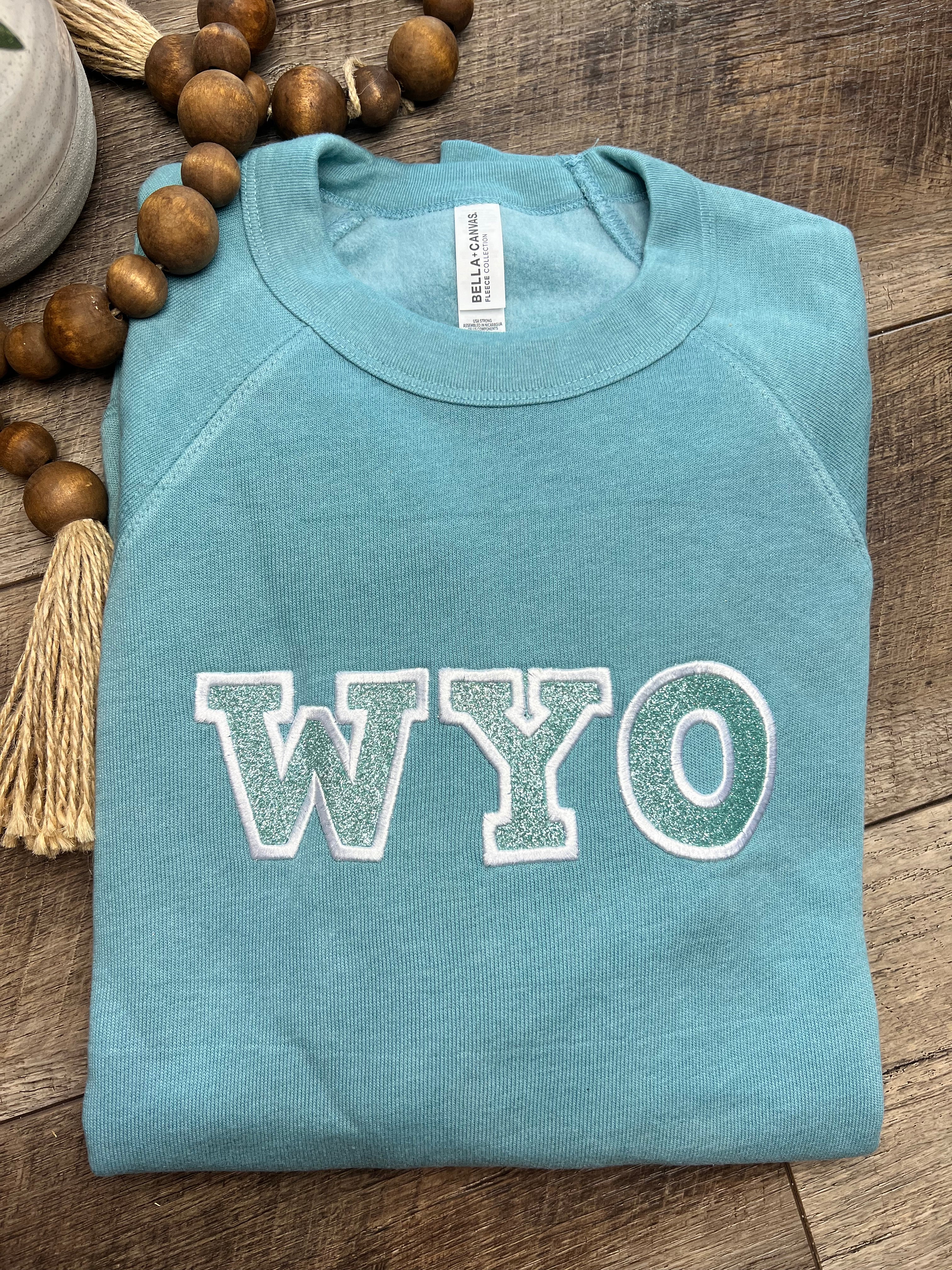 Embroidered Glitter Wyo Fleece Crew