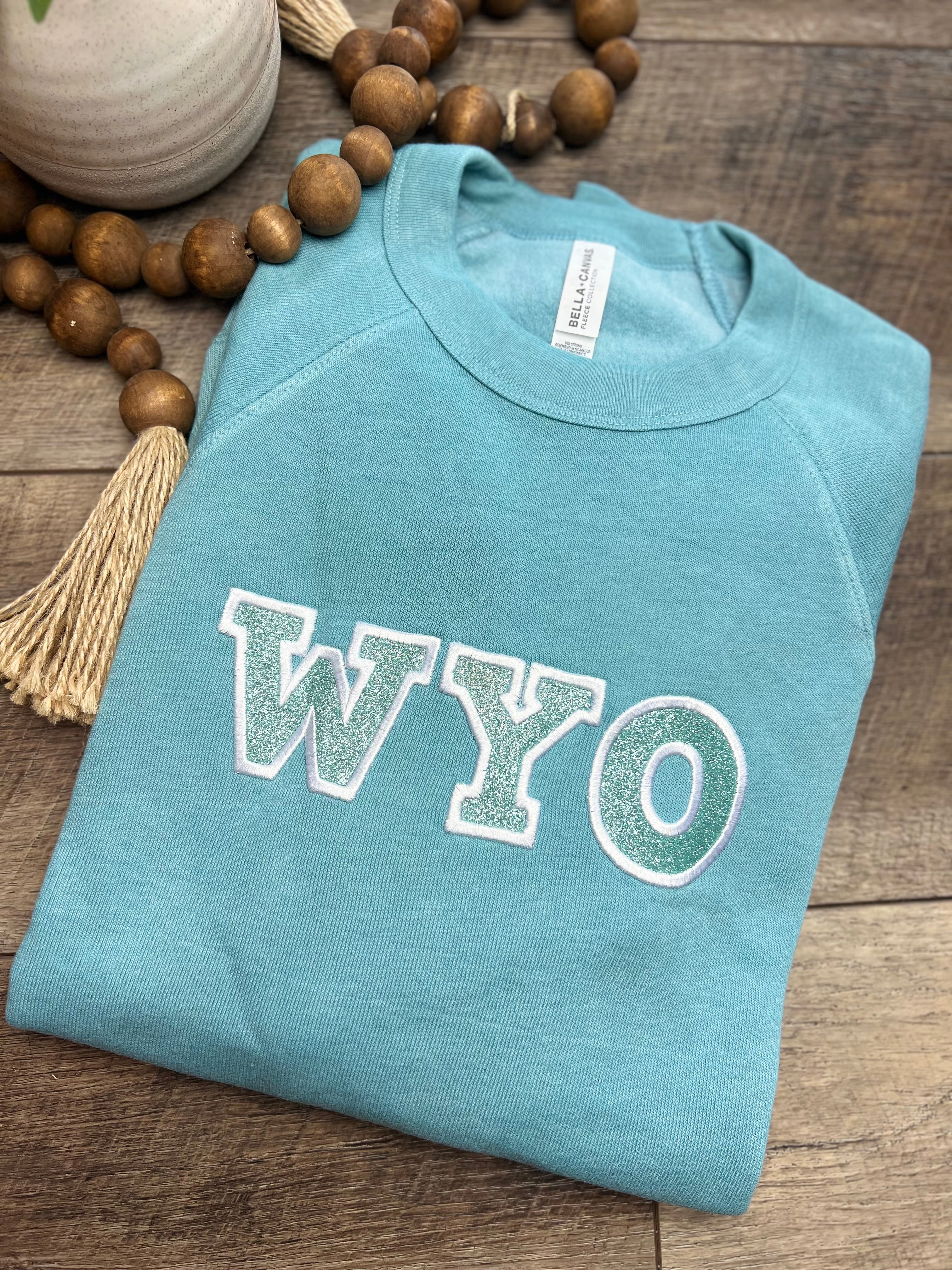 Embroidered Glitter Wyo Fleece Crew