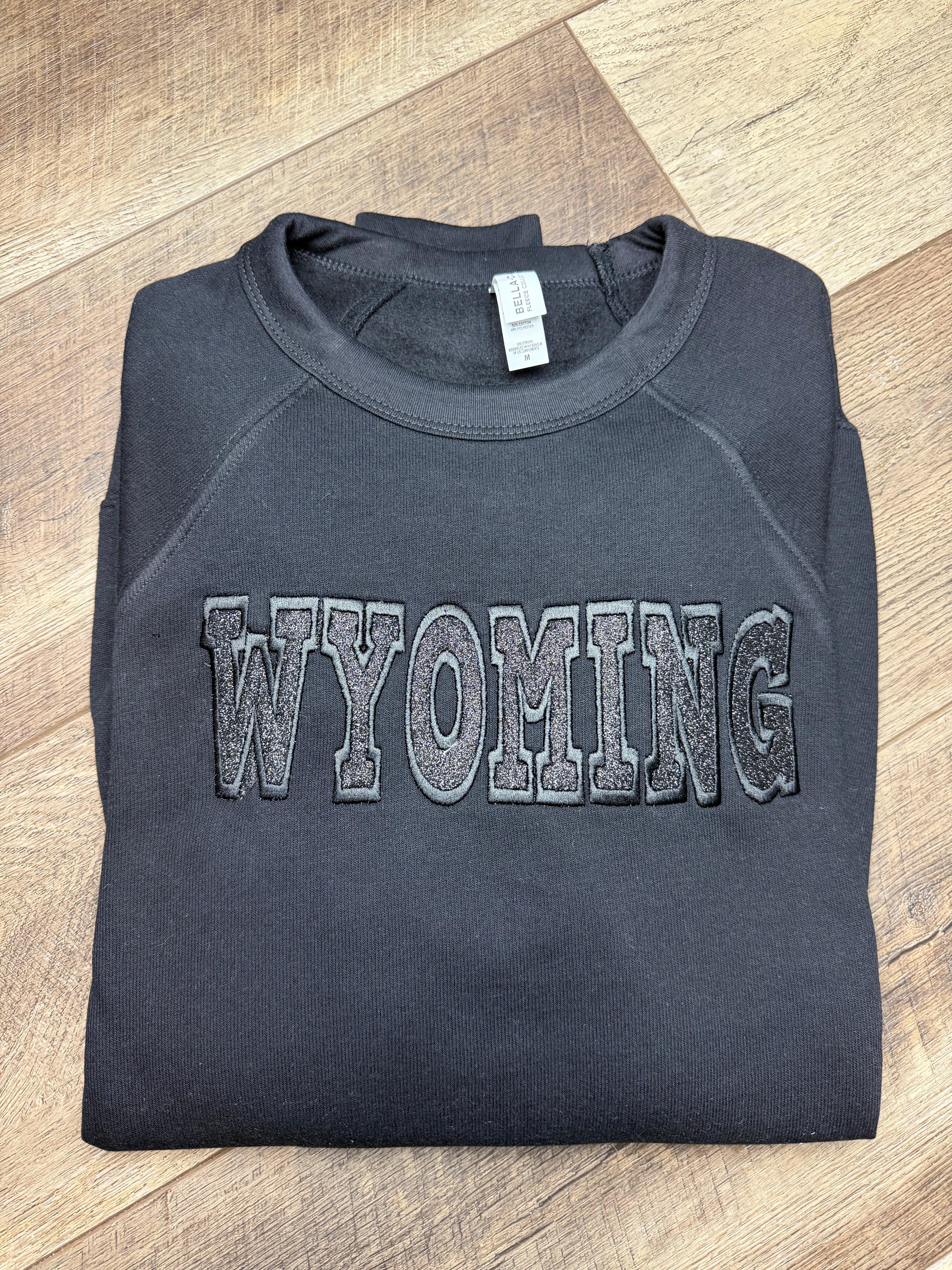 Embroidered Glitter Black Wyoming Fleece Crew