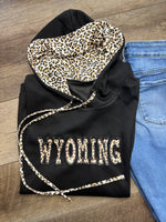 Embroidered Wyoming Jet Stream Leopard Contrast Drawstring Hood Drop Shoulder Loose Top