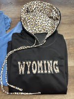 Embroidered Wyoming Jet Stream Leopard Contrast Drawstring Hood Drop Shoulder Loose Top