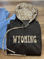 Embroidered Wyoming Jet Stream Leopard Contrast Drawstring Hood Drop Shoulder Loose Top