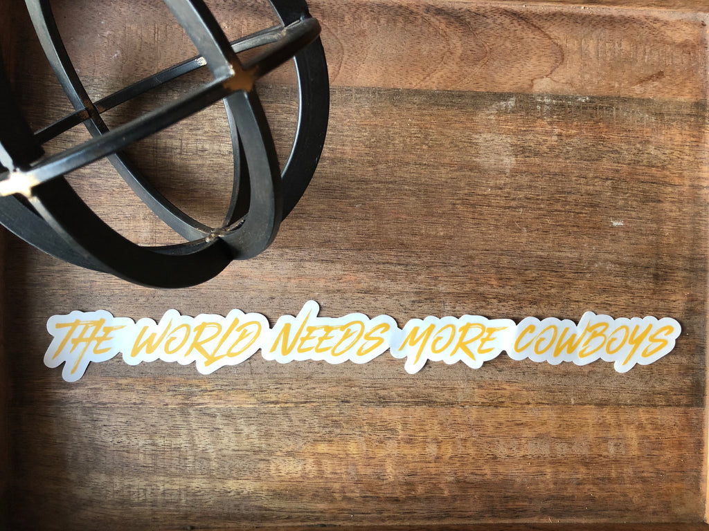 “The World Needs More Cowboys” Decal 15" Wide